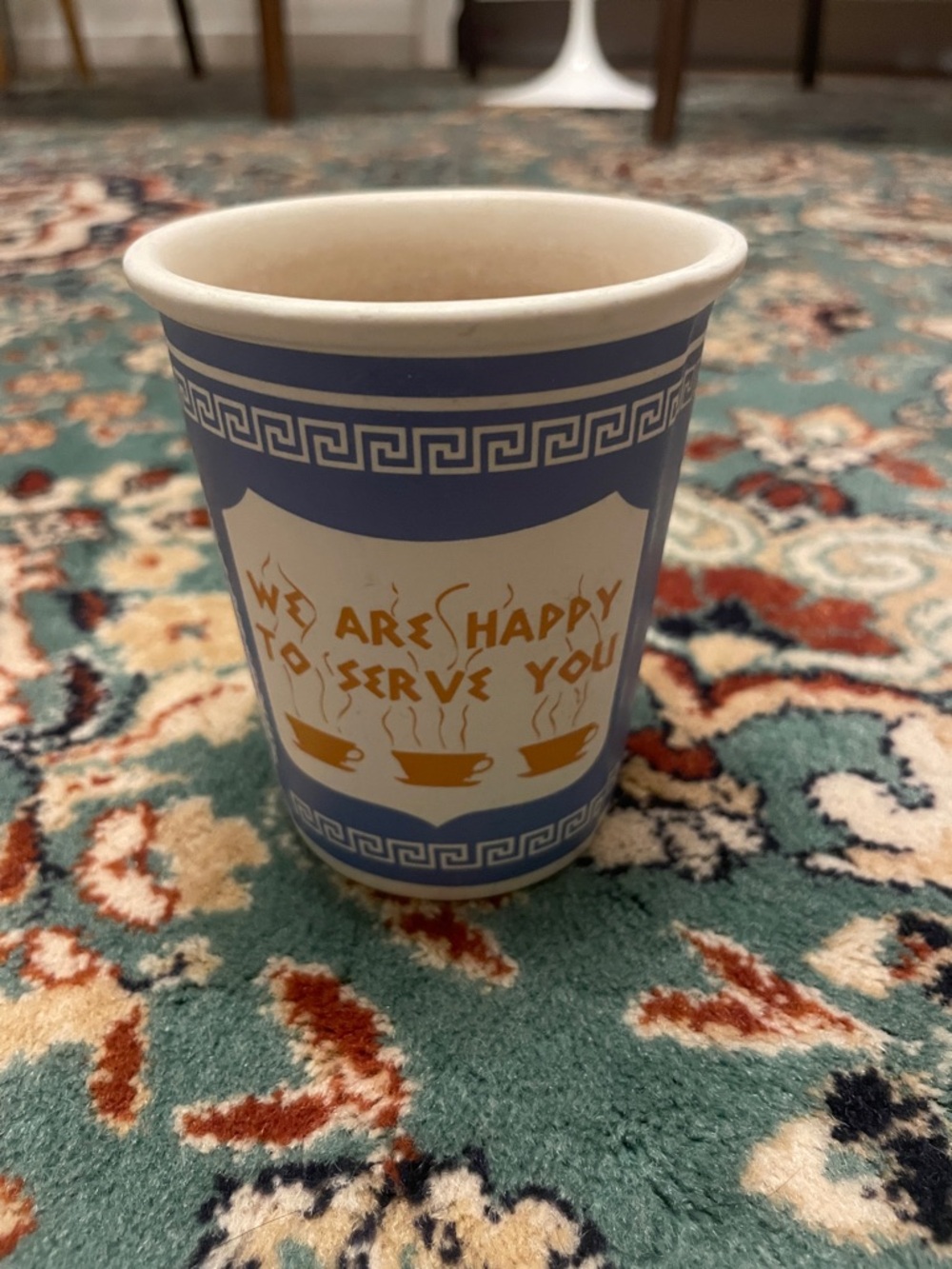 Blue and White Ceramic Coffee Cup - "We Are Happy To Serve You"